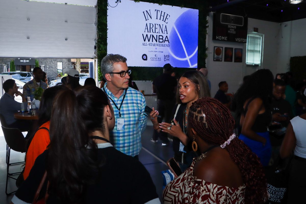 Members in conversation at an Arena event
